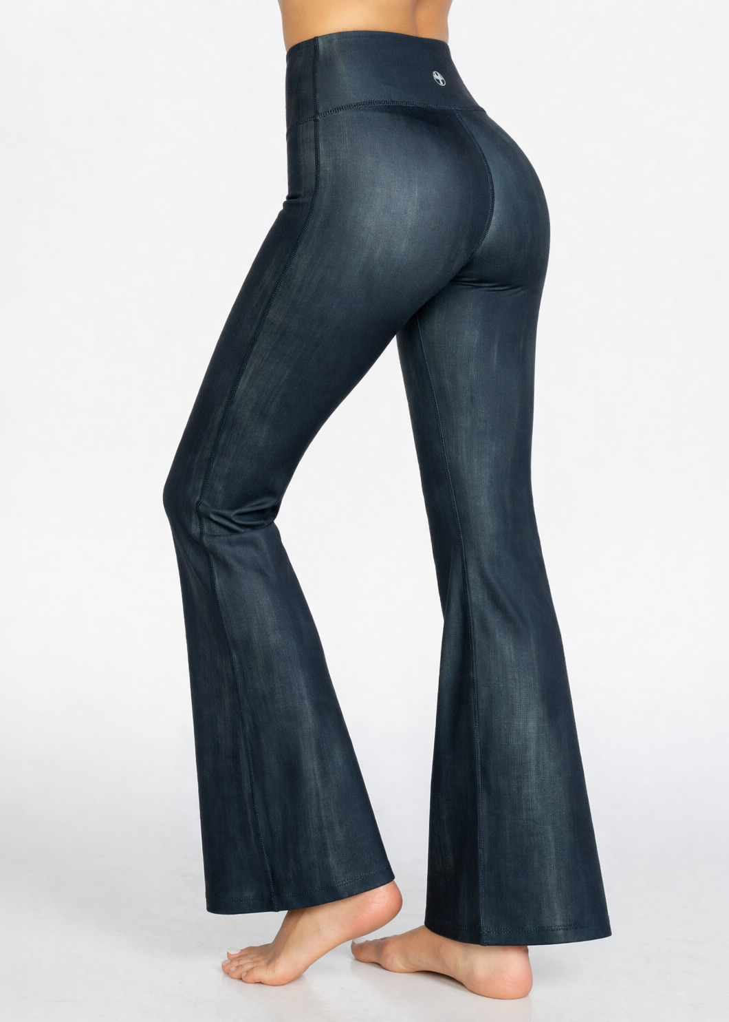 Dark blue flared pants on a white background